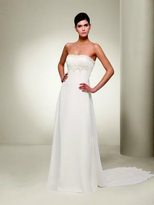 At first i like to have a simple white wedding gown like this one